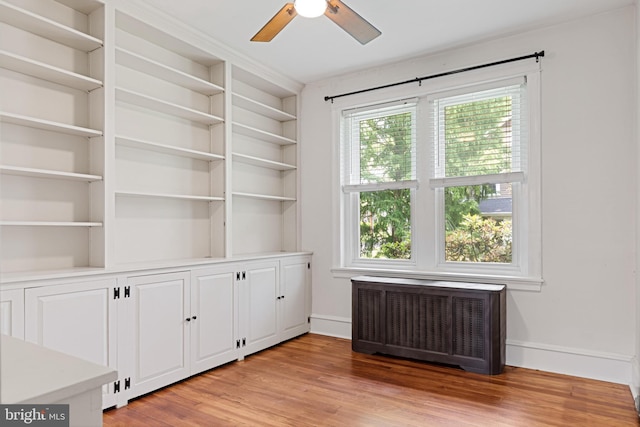 28 N Wakefield, Jeffersonville, PA 19403 - empty room featuring radiator, light wood-type flooring, and a ceiling fan