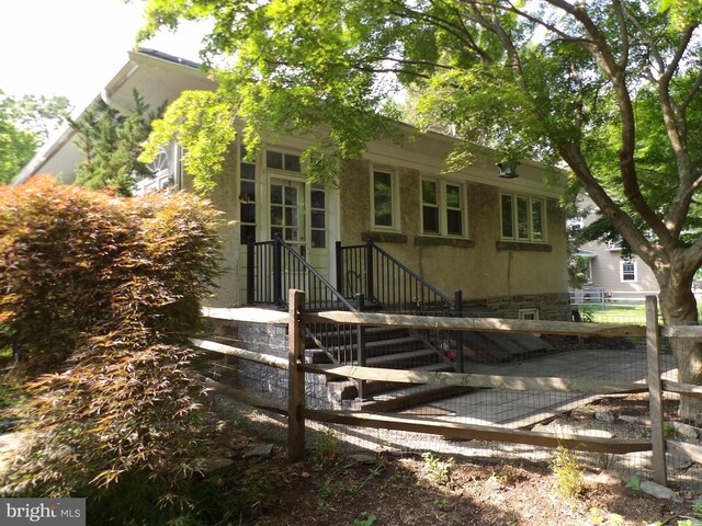 28 N Wakefield, Jeffersonville, PA 19403 - rear view of property featuring stucco siding
