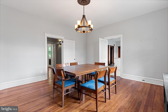 28 N Wakefield, Jeffersonville, PA 19403 - dining area with a chandelier, baseboards, and wood finished floors