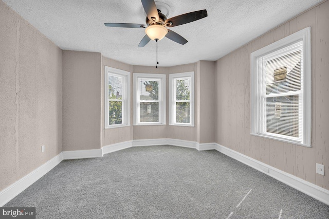 602 Market St, Gloucester City, NJ 08030 - spare room featuring a textured ceiling, a ceiling fan, and carpet flooring