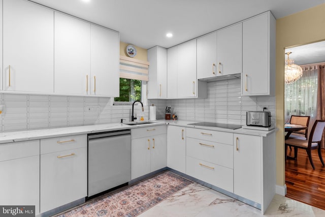 95 Meadowfield Dr, Southampton, PA 18966 - kitchen featuring stainless steel dishwasher, a sink, black electric cooktop, a chandelier, and light marble finish flooring