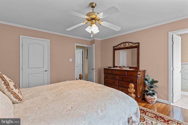 95 Meadowfield Dr, Southampton, PA 18966 - bedroom featuring wood finished floors, ornamental molding, baseboards, a ceiling fan, and ensuite bathroom