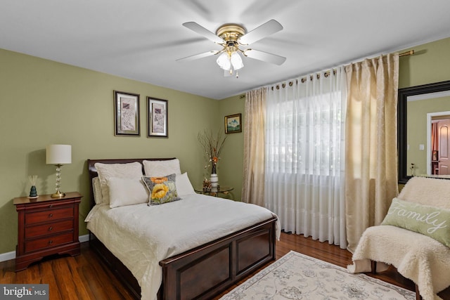 95 Meadowfield Dr, Southampton, PA 18966 - bedroom with dark wood-type flooring, a ceiling fan, and baseboards