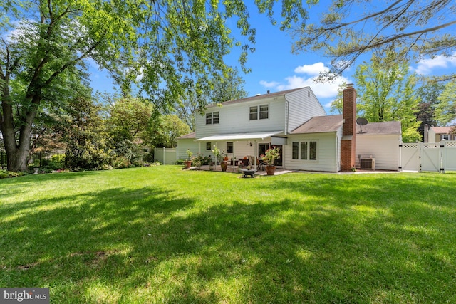 95 Meadowfield Dr, Southampton, PA 18966 - back of house with a gate, central AC, a patio, a chimney, and an outdoor fire pit