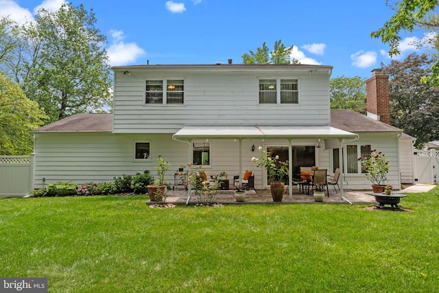 95 Meadowfield Dr, Southampton, PA 18966 - back of property with a gate, a patio area, a chimney, and roof with shingles