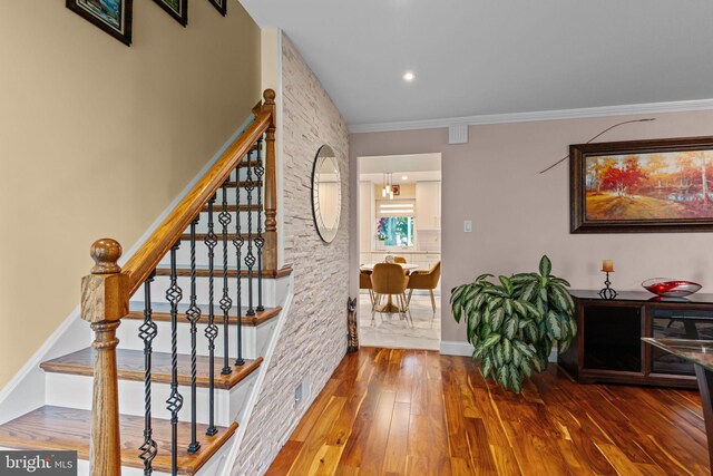 95 Meadowfield Dr, Southampton, PA 18966 - stairs with wood finished floors, crown molding, and baseboards