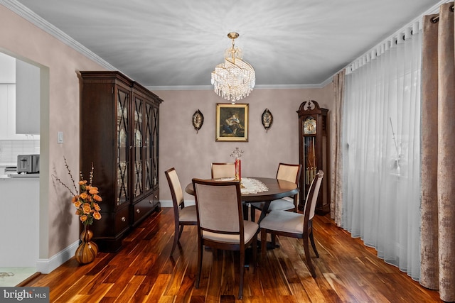 95 Meadowfield Dr, Southampton, PA 18966 - dining space featuring hardwood / wood-style floors, a chandelier, crown molding, and baseboards