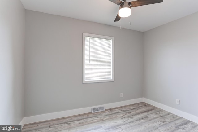 8678 Paxton St, Hummelstown, PA 17036 - empty room with wood finished floors, a ceiling fan, and baseboards