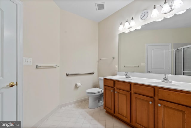 902 Macphail Woods Xing Unit 2I, Bel Air, MD 21015 - bathroom featuring double vanity, a shower with shower door, toilet, baseboards, and tile patterned floors