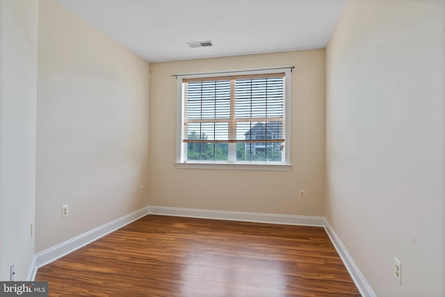 902 Macphail Woods Xing Unit 2I, Bel Air, MD 21015 - spare room featuring wood finished floors and baseboards