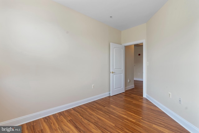 902 Macphail Woods Xing Unit 2I, Bel Air, MD 21015 - empty room featuring baseboards and wood finished floors