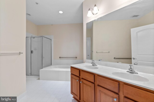 902 Macphail Woods Xing Unit 2I, Bel Air, MD 21015 - bathroom with a bath, a shower stall, double vanity, and tile patterned floors