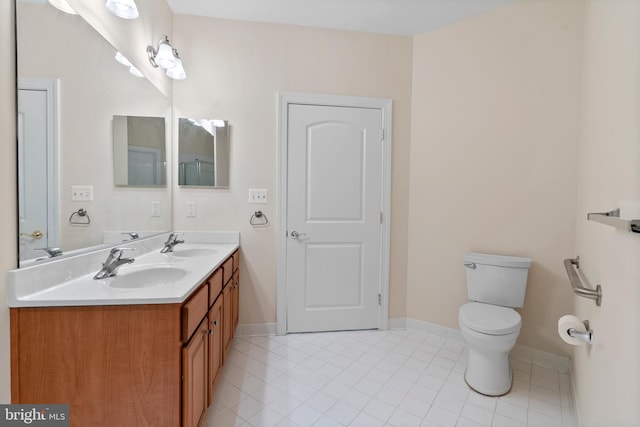 902 Macphail Woods Xing Unit 2I, Bel Air, MD 21015 - bathroom with tile patterned flooring, double vanity, toilet, and baseboards