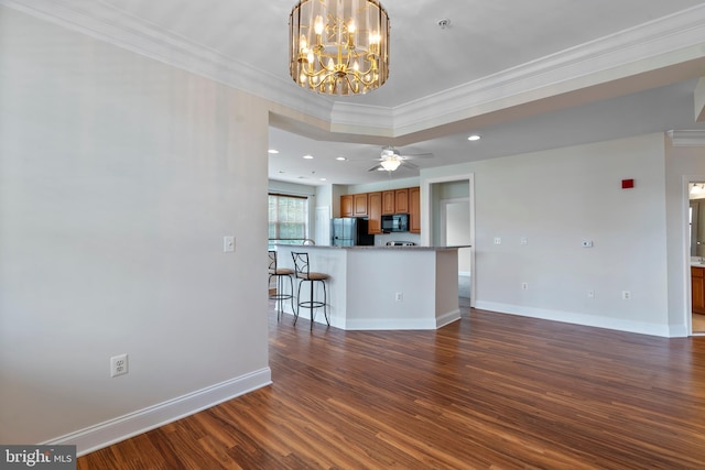 902 Macphail Woods Xing Unit 2I, Bel Air, MD 21015 - unfurnished living room featuring ornamental molding, wood finished floors, a chandelier, baseboards, and recessed lighting