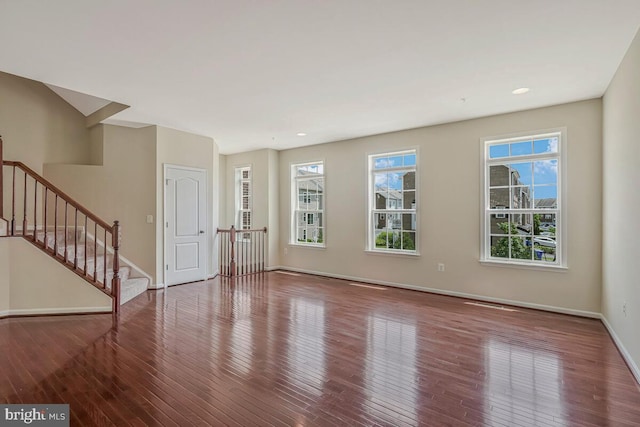 12310 Sandstone St, Waldorf, MD 20601 - unfurnished living room featuring hardwood / wood-style floors, stairs, and recessed lighting