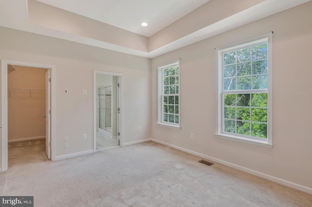 12310 Sandstone St, Waldorf, MD 20601 - unfurnished bedroom with a spacious closet, carpet flooring, and ensuite bathroom