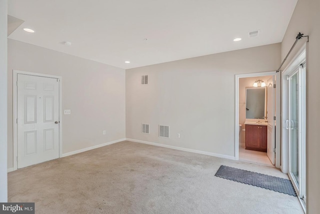 12310 Sandstone St, Waldorf, MD 20601 - spare room with light colored carpet and recessed lighting