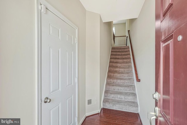 12310 Sandstone St, Waldorf, MD 20601 - stairs featuring wood finished floors and baseboards