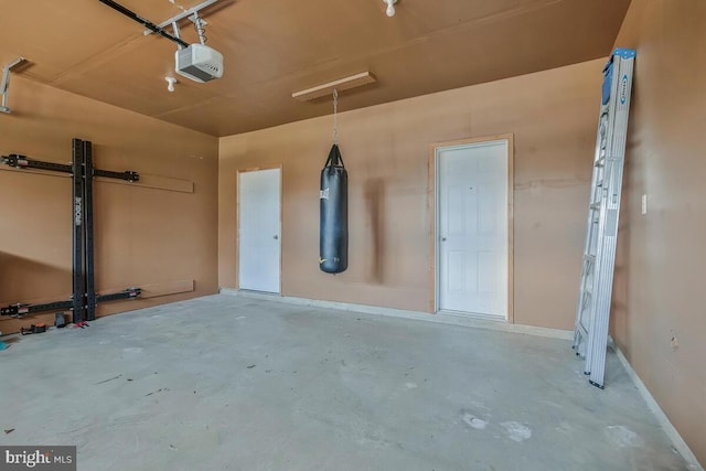 12310 Sandstone St, Waldorf, MD 20601 - garage with a garage door opener and baseboards