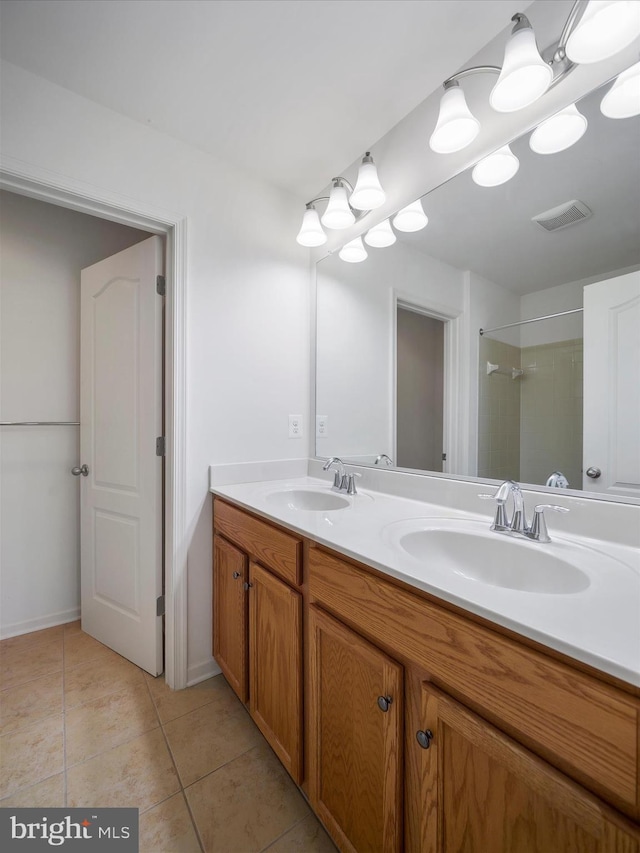 18238 Hurricane Ct, Hagerstown, MD 21740 - full bath with double vanity, tile patterned flooring, and a shower