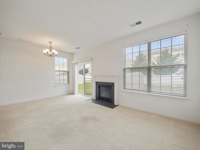 18238 Hurricane Ct, Hagerstown, MD 21740 - unfurnished living room featuring a chandelier, baseboards, carpet floors, and a fireplace with flush hearth
