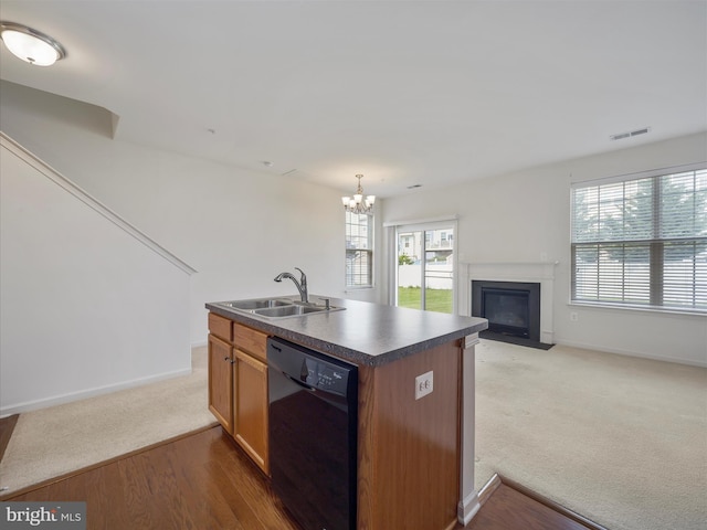 18238 Hurricane Ct, Hagerstown, MD 21740 - kitchen featuring black dishwasher, a sink, dark countertops, open floor plan, and a chandelier