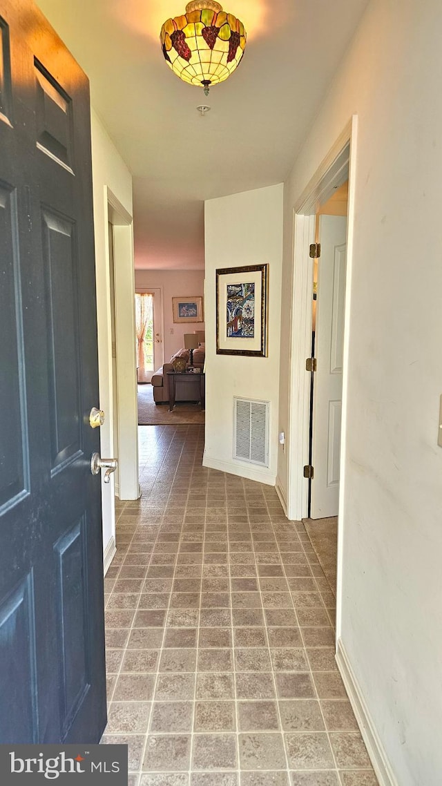 5934 Tappan Ln, Salisbury, MD 21801 - foyer featuring baseboards and brick patterned flooring