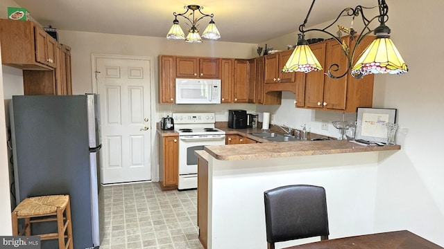 5934 Tappan Ln, Salisbury, MD 21801 - kitchen with white appliances, a peninsula, a sink, light floors, and brown cabinets