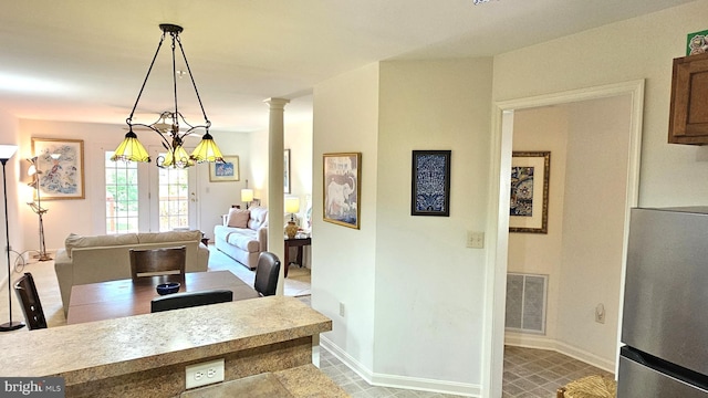 5934 Tappan Ln, Salisbury, MD 21801 - dining area with baseboards and ornate columns