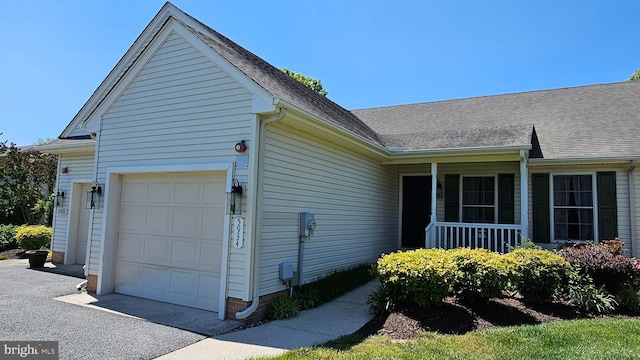 5934 Tappan Ln, Salisbury, MD 21801 - view of property exterior with a garage and a porch