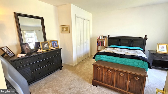 5934 Tappan Ln, Salisbury, MD 21801 - bedroom with light carpet, a closet, and baseboards