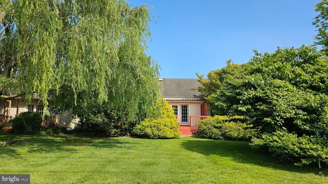 5934 Tappan Ln, Salisbury, MD 21801 - view of green lawn with a deck