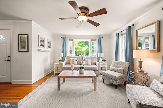 231 Rogers, Eagleville, PA 19403 - living room with wood finished floors, a ceiling fan, crown molding, and baseboards