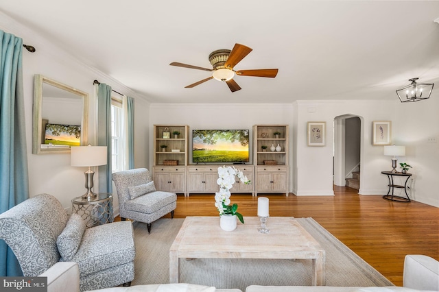 231 Rogers, Eagleville, PA 19403 - living room with arched walkways, a ceiling fan, wood finished floors, ornamental molding, and baseboards