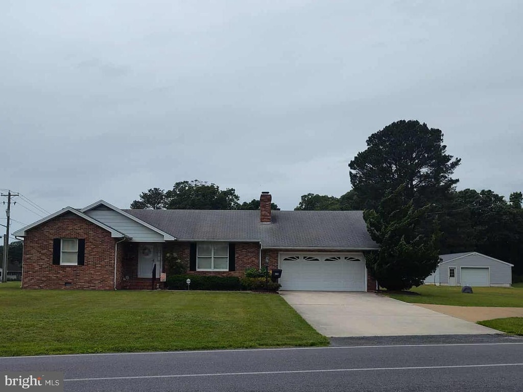 350 Tilghman Rd, Salisbury, MD 21804 - ranch-style house with a garage, concrete driveway, brick siding, and a front yard