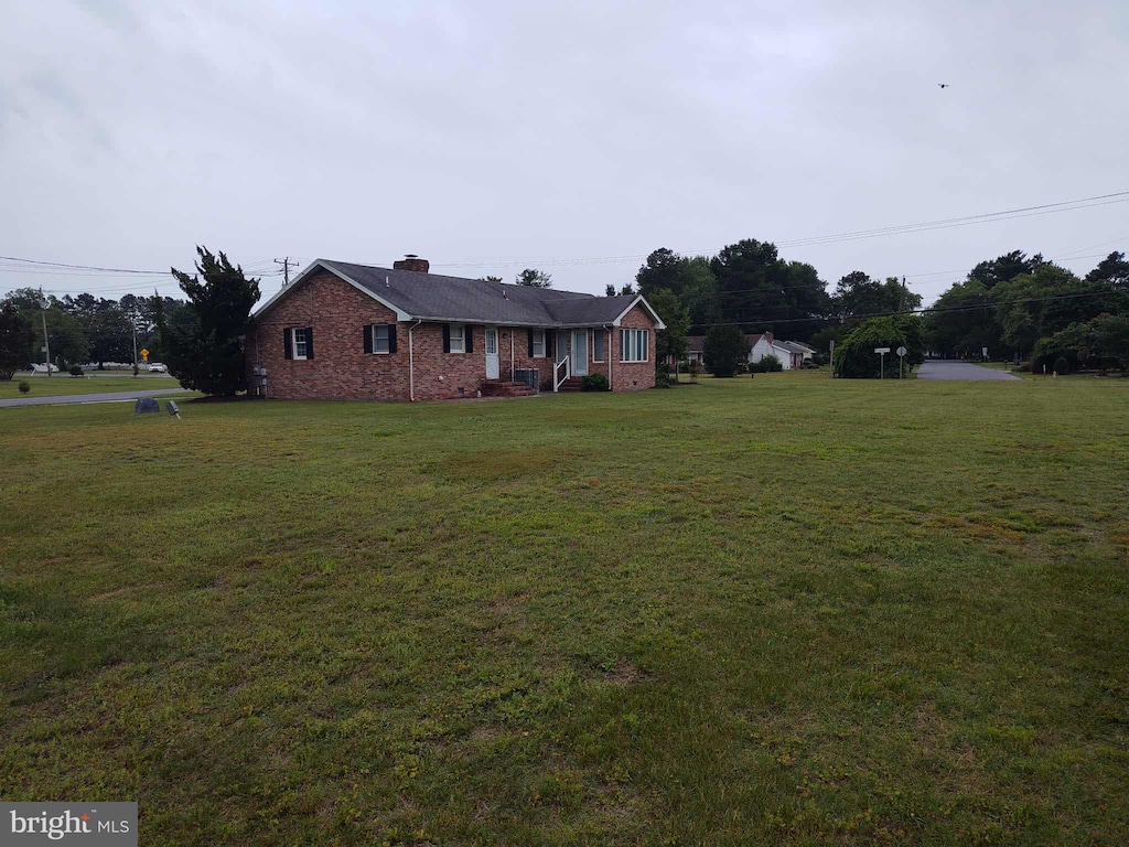 350 Tilghman Rd, Salisbury, MD 21804 - ranch-style home with a front lawn, brick siding, and a chimney