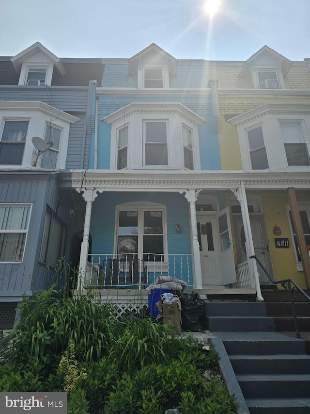 753 N 12th St, Reading, PA 19604 - townhome / multi-family property with covered porch