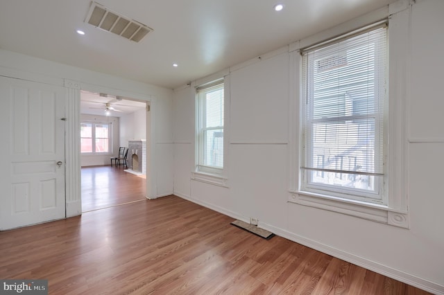 753 N 12th St, Reading, PA 19604 - empty room featuring light wood-style floors and recessed lighting