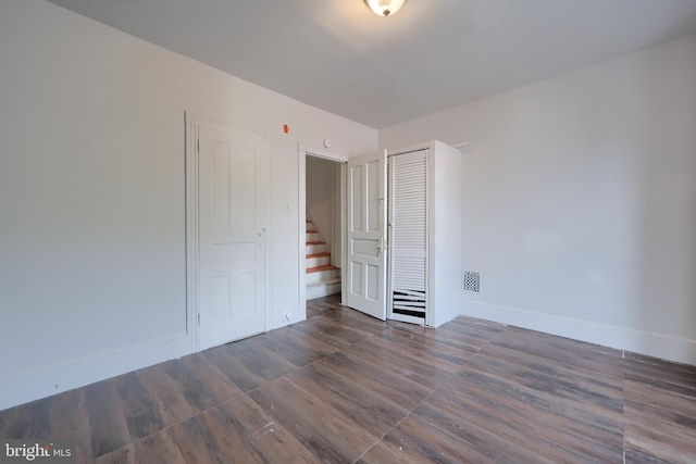 753 N 12th St, Reading, PA 19604 - empty room with baseboards and wood finished floors