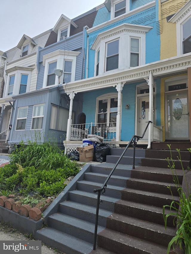 753 N 12th St, Reading, PA 19604 - townhome / multi-family property featuring a porch and stairway