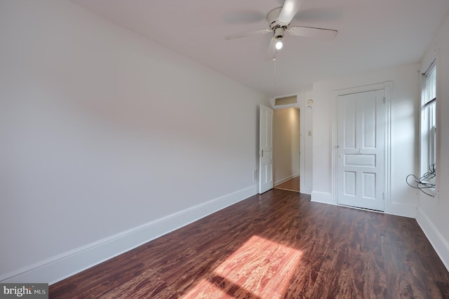 753 N 12th St, Reading, PA 19604 - unfurnished bedroom with dark wood-style floors, ceiling fan, and a closet