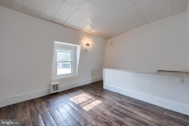753 N 12th St, Reading, PA 19604 - empty room with wood finished floors and baseboards