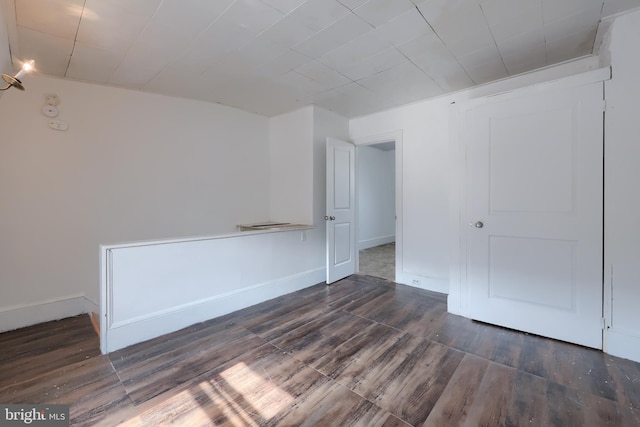 753 N 12th St, Reading, PA 19604 - empty room featuring wood finished floors and baseboards