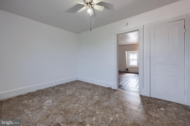 753 N 12th St, Reading, PA 19604 - spare room featuring ceiling fan and baseboards