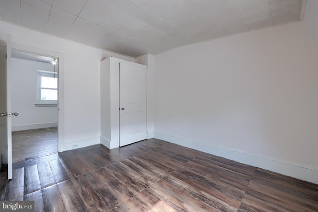 753 N 12th St, Reading, PA 19604 - spare room with baseboards and dark wood-style floors