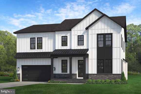 6654 Chilton Ct, Mclean, VA 22101 - modern farmhouse with board and batten siding, a garage, a front lawn, and concrete driveway