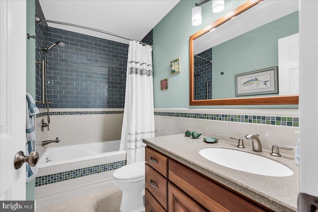 109 Great Circle Rd, Newark, DE 19711 - bathroom featuring tiled shower / bath combo, vanity, toilet, tile walls, and tile patterned flooring