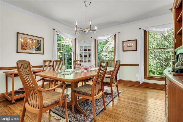 109 Great Circle Rd, Newark, DE 19711 - dining room with a chandelier, healthy amount of natural light, ornamental molding, light wood-type flooring, and baseboards