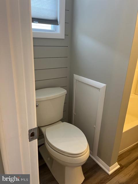 8 Florence Tollgate Pl, Florence, NJ 08518 - bathroom featuring wood finished floors, toilet, and baseboards
