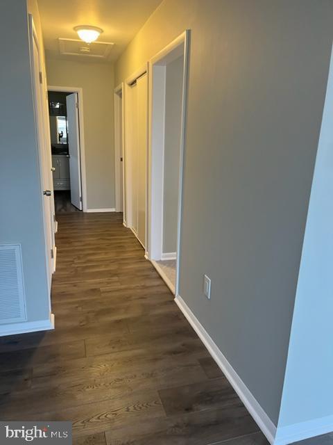 8 Florence Tollgate Pl, Florence, NJ 08518 - corridor with baseboards and dark wood-style floors